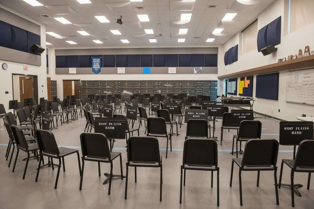 The band hall and choir rooms are spacious, but the most interesting parts of the music suite are much smaller private practice studios. Students rehearse or take private lessons in these rooms, each of which is equipped with a Wenger Virtual Acoustic Enhancement System. The VAE interface uses advanced audio technology to mimic the sound of performances in different environments—from a cathedral to  an arena.  “They can practice anytime they want to, record it and play it back,” says Band Director Heath Nall, who pushes a button on the interface and snaps his fingers. Despite the tiny, sound-proof environment, the snap resonates as if echoing off the stage and walls of a recital hall. “It’s really nice.”